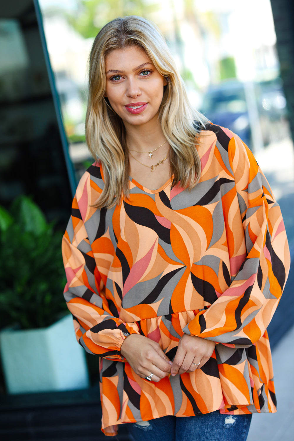 Rust Abstract Print V Neck Peplum Top