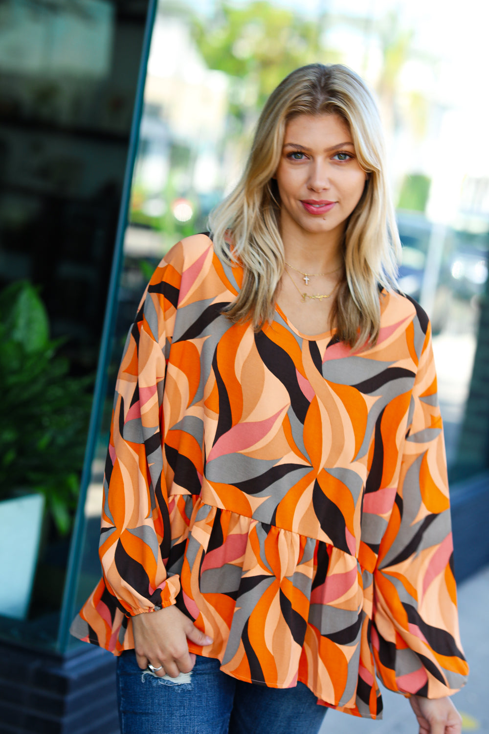 Rust Abstract Print V Neck Peplum Top