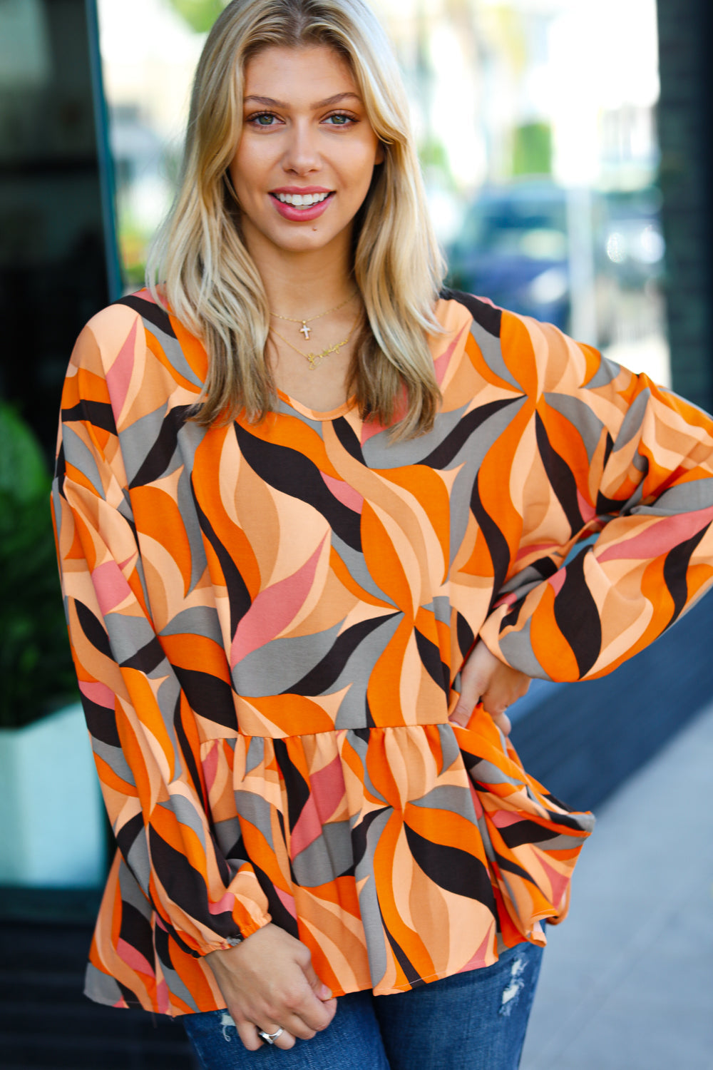 Rust Abstract Print V Neck Peplum Top