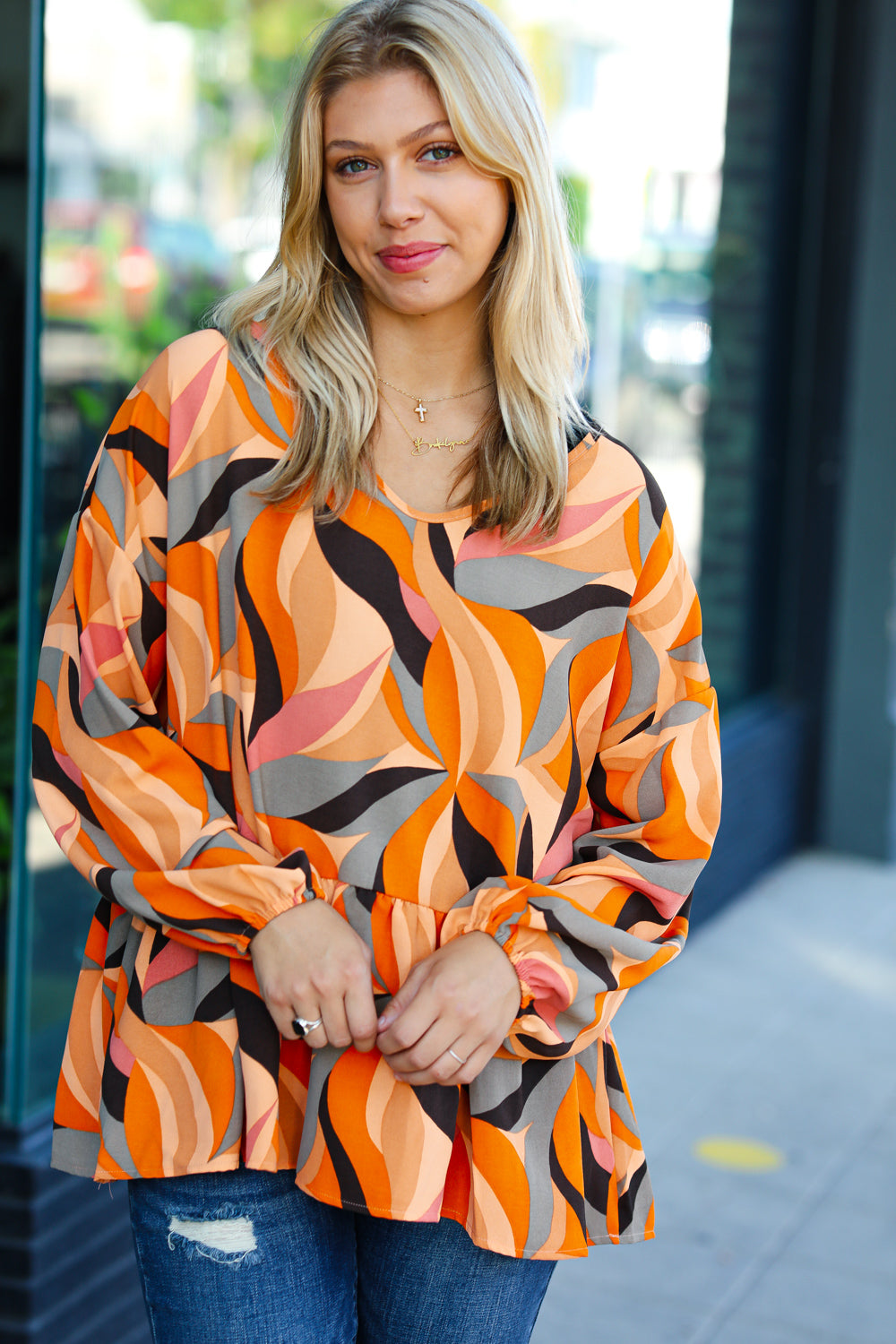 Rust Abstract Print V Neck Peplum Top