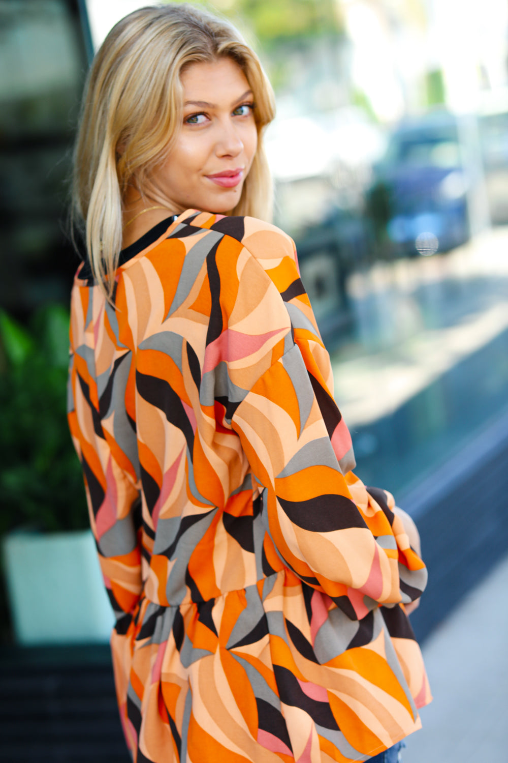 Rust Abstract Print V Neck Peplum Top